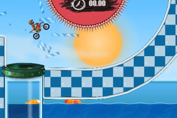 Moto X3M Pool Party bike racing along a beach track with inflatable obstacles